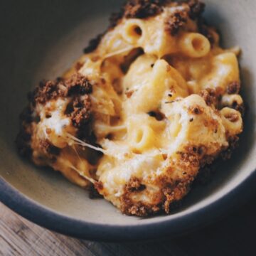 a close up of bowl of gluten free butternut squash mac and cheese