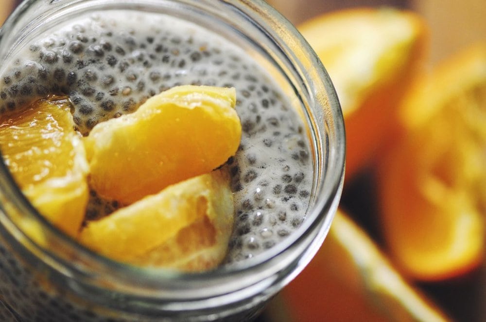  Creamy, Dreamy, Orange Delight Chia Seed Pudding (Gluten Free, Vegan) - Gluten Free, Vegan and full of protein, vitamin c and fiber. This delicious chia seed pudding tastes just like a creamsicle... the healthy version! | moonandspoonandyum.com #chia #chiaseeds #pudding #chiaseedpudding #glutenfree #vegan #Breakfast #brunch #healthy #easy #orange #creamsicle #orangesicle #dreamsicle #dessert 