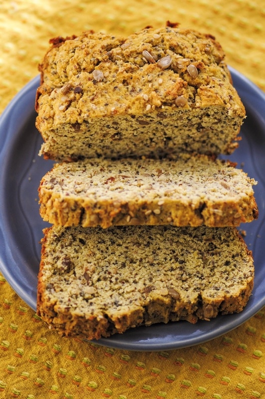  This delicious Gluten-Free Coconut Flour Bread is filled with flax, chia, sunflower and sesame seeds, is super easy to slice and store and has a most delicious flavor! #coconutflourbread #bread #coconutflour #glutenfree #easy #healthy #seeds #seeded #baking 