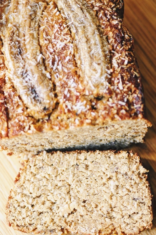  This Gluten-Free Coconut Banana Bread makes for one luscious and hearty loaf perfect for breakfast, a snack or a healthy treat! #glutenfreebread #coconutbananabread #bananabread #coconut #healthy #highprotein #baking 