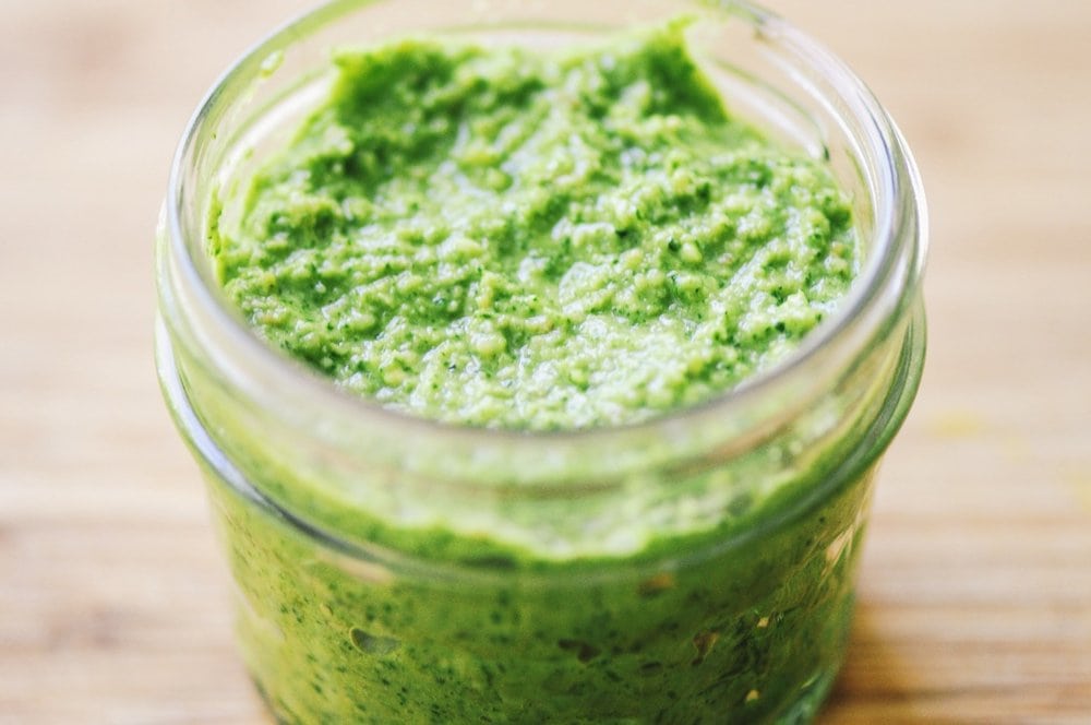  Super healthy, easy, delicious and vibrant green Cilantro Pesto perfect as a dip, topping, on pizza and pasta or any way you would use your favorite condiment! #pesto #cilantro #cilantropesto #sauce #green #healthy #condiment #vegetarian 