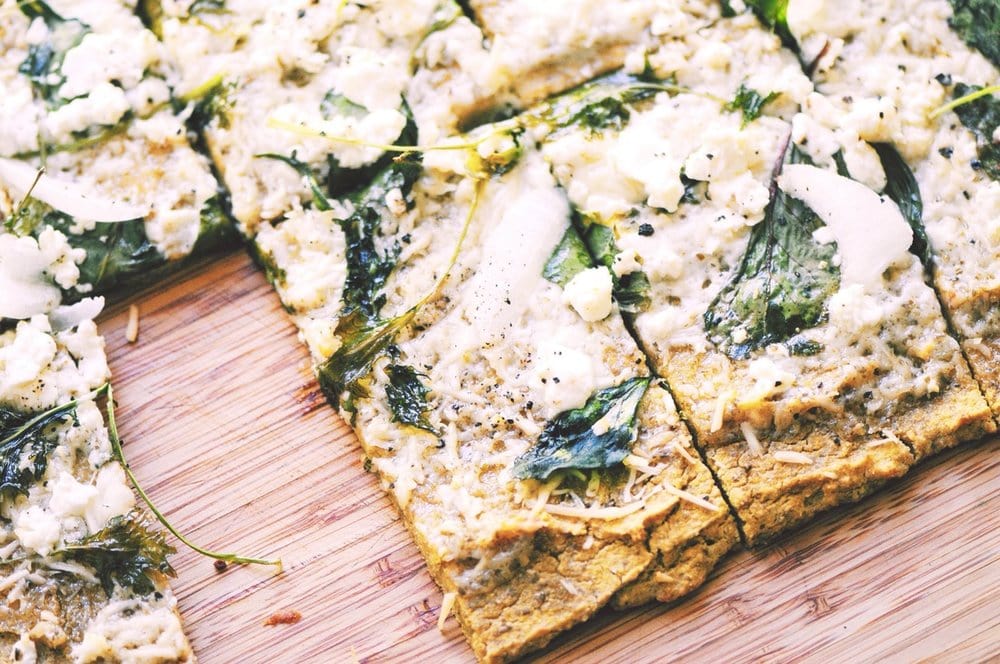  A delicious high-protein gluten-free pizza crust made with butternut squash, lentils, and almond flour! #butternutsquashpizzacrust #lentilpizzacrust #almondflourpizzacrust #glutenfreepizza #glutenfreeflatbread 