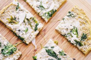 almond flour pizza crust with feta and spinach