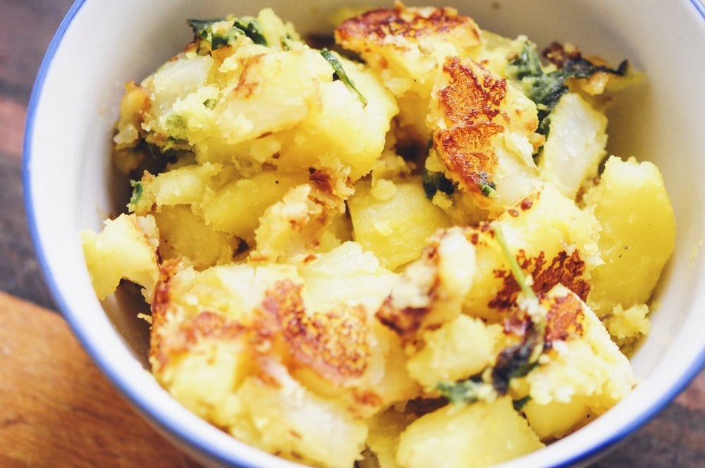  These gluten-free and vegan Creamy Toasted Warm Spiced Potatoes make for one big bowl of comfort food with their delightful blend of flavors and textures! #veganpotatoes #vegansidedish #spicedpotatoes #creamypotatoes #easysidedish #glutenfreesidedish #comfortfood 