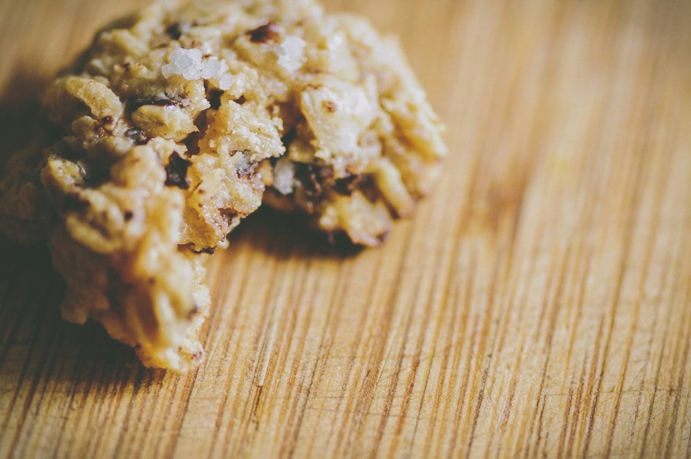  These 5-ingredient Gluten-Free & Vegan Salted Chocolate Chunk Tahini Oatmeal Cookies make for one quick, easy, healthy and delicious treat perfect for breakfast, a snack or a dessert! #tahinicookies #vegancookies #glutenfreecookies #oatmealcookies #5ingredientcookies #saltedchocolatecookies #glutenfreetahinicookies #refinedsugarfree 