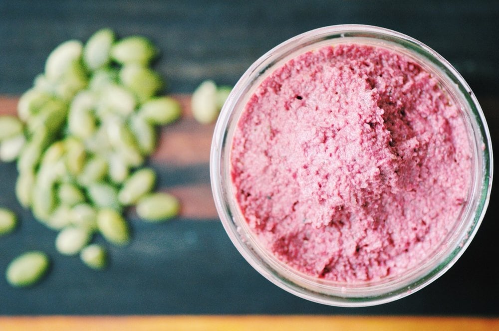  This thick, creamy, and delicious Beet and Pumpkin Seed Pesto is an absolute savory delight! Its versatility will have you putting it on anything & everything; and its amazing flavor will have you coming back for more again & again! #beetpesto #pumpkinseedpesto #beetroot #pumpkin #pesto #pink #glutenfree 