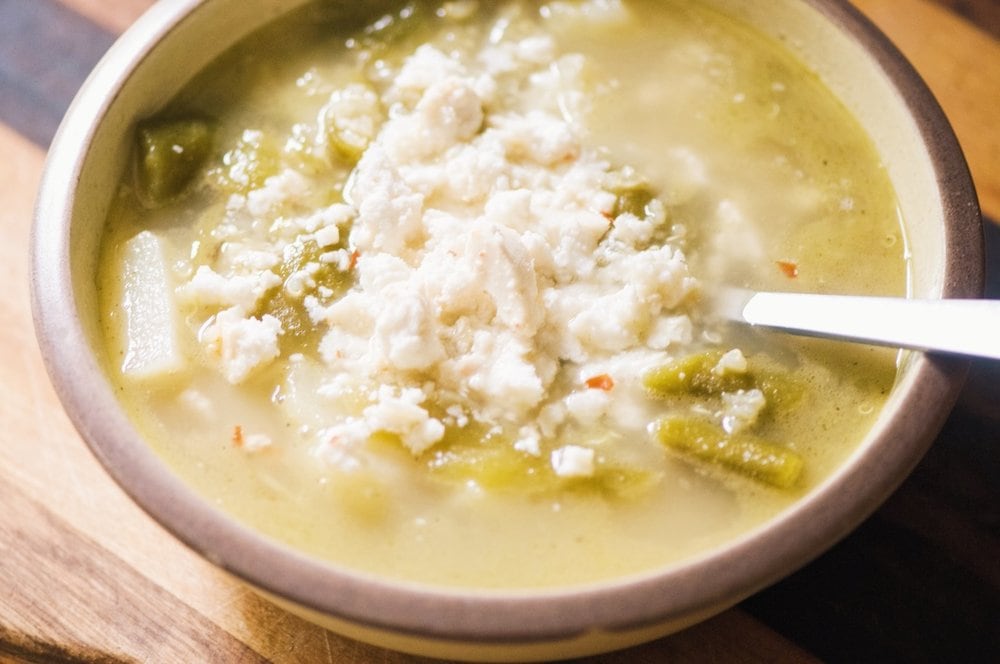  A warm, hearty, filling, nutritiously satisfying and amazingly delicious soup! Spicy roasted Hatch green chiles, potatoes, and protein-rich quinoa combine beautifully in this quick and easy to make nourishing soup. #greenchile #potatosoup #greenchilesoup #quinoasoup #vegansoup #glutenfreesoup #hatchchilerecipes 