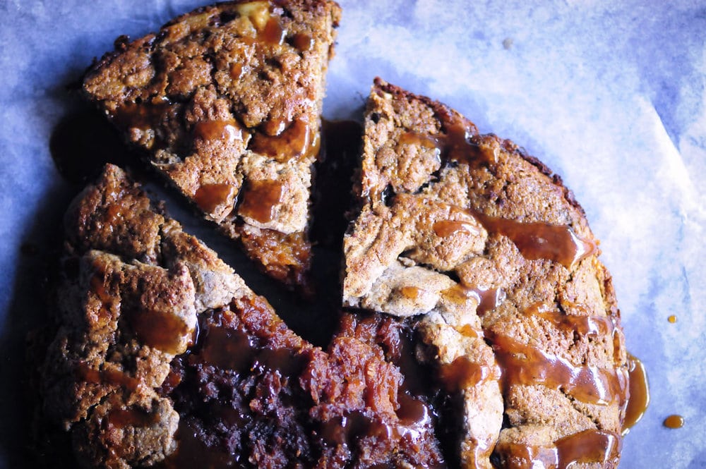  An intoxicatingly spiced apple and butternut squash filling enveloped in a gluten-free chai tea infused buckwheat crust drizzled with a delectable coconut caramel drizzle. This rustic pie makes for the perfect autumn dessert! #glutenfreegalette #applegalette #butternutsquashgalette #chaipie #buckwheatpiecrust #coconutcaramel #glutenfreepie #dessert #autumn 