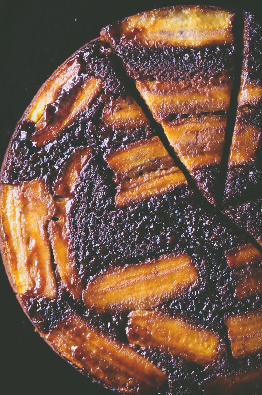  This Upside Down Caramelized Gingerbread Banana Cake is gluten-free, super quick and easy to make, and is incredibly delicious with its perfectly spiced gingerbread base topped with sticky caramelized bananas. It makes for one perfect holiday dessert certain to impress the pickiest of guests! #upsidedownbananacake #upsidedowncake #gingerbreadcake #glutenfreecake #caramelizedcake 