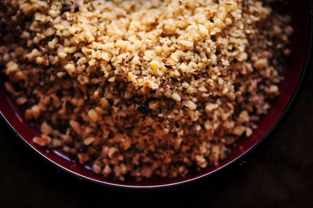  This easy, beautiful and delicious Roasted Walnut Dukkah is made with a blend of walnuts, sesame seeds, cumin seeds, coriander, black peppercorns, and sea salt. You'll find yourself putting this Egyptian condiment on anything and everything as you fall in love with its complex flavors and pleasing textures! #dukkah #duqqa #egyptian #condiment #walnutdukkah #spiceblend 
