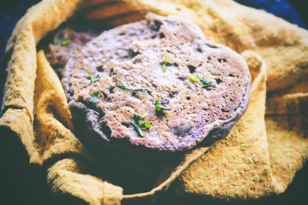 A thick, and chewy Gluten-Free Buckwheat Naan Bread with a fluffy interior, using only 9 ingredients to make, and with an absolutely divine flavor and texture. They make the perfect gluten-free accompaniment to your favorite Indian dishes or all on their own! #glutenfreenaan #indianbread #buckwheatnaan #glutenfreenaanbread #naan 