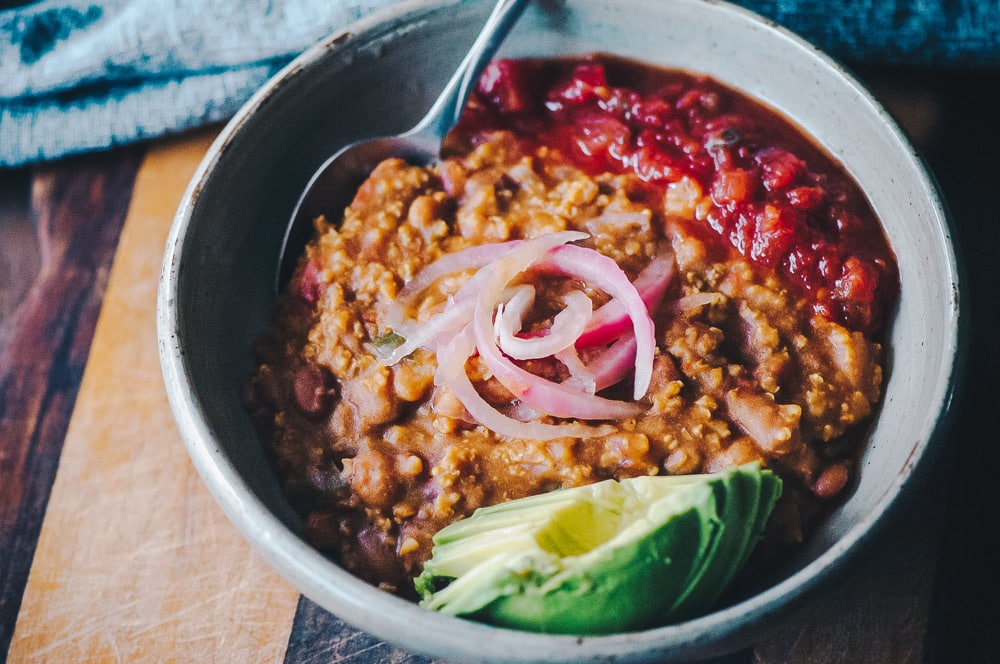  This Instant Pot Millet and Pinto Bean Chili makes for one super flavorful, healthy, protein-packed and easy to make gluten-free vegan meal! #instantpotchili #milletchili #pintobeanchili #veganchili #pressurecookerchili #vegetarianchili 