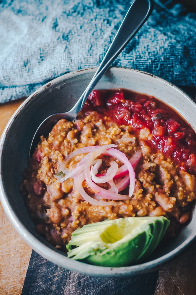  This Instant Pot Millet and Pinto Bean Chili makes for one super flavorful, healthy, protein-packed and easy to make gluten-free vegan meal! #instantpotchili #milletchili #pintobeanchili #veganchili #pressurecookerchili #vegetarianchili 