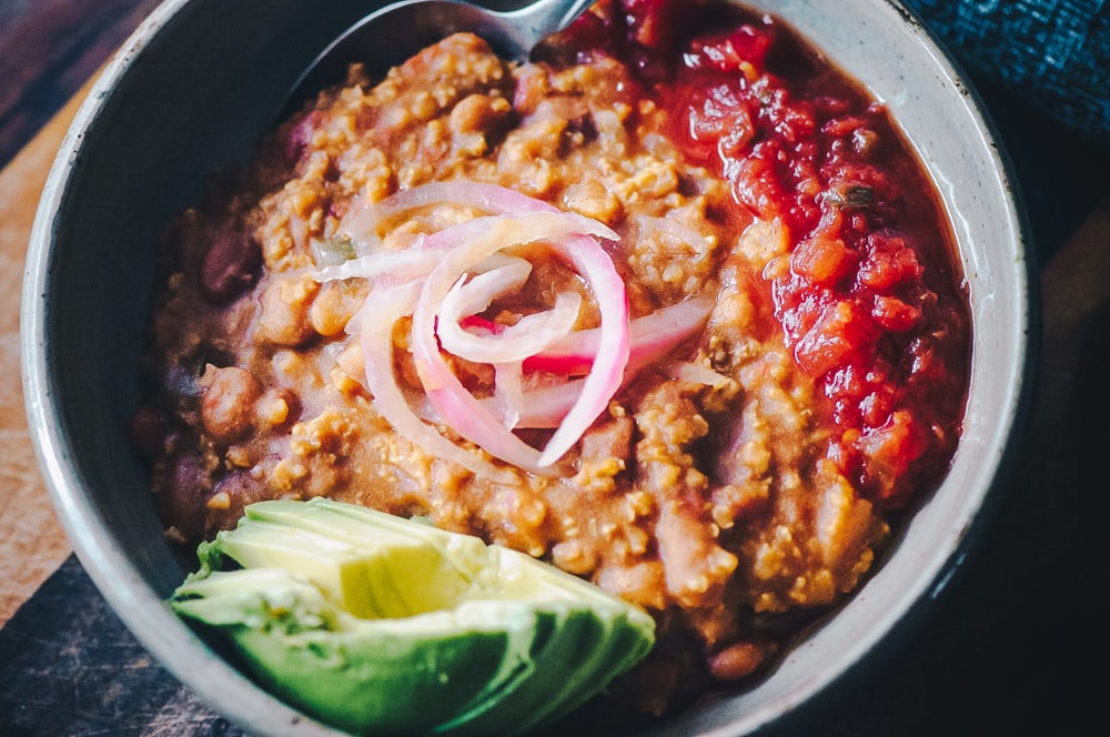  This Instant Pot Millet and Pinto Bean Chili makes for one super flavorful, healthy, protein-packed and easy to make gluten-free vegan meal! #instantpotchili #milletchili #pintobeanchili #veganchili #pressurecookerchili #vegetarianchili 