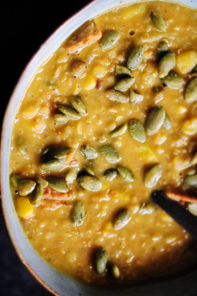  An easy, healthy, and delicious protein-packed gluten-free vegan Southwestern Chowder chock-full of corn, potatoes, quinoa, red lentils, green chiles, chipotle peppers, veggies and an amazing blend of spices. This amazingly delicious vegetarian chowder is incredibly filling, comforting, and flavorful and makes a great lunch or dinner! #vegancornchowder #quinoasoup #spicychowder #southwesterncuisine #potatochowder #lentilchowder #glutenfreechowder 