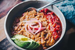 a white bowl filled with vegan chili