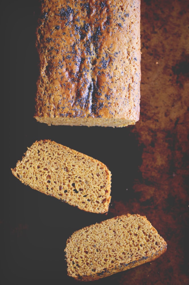  A perfectly moist, subtly sweet, lemon poppy seed loaf made with chickpea (garbanzo bean) flour! This gluten-free bread makes a great healthy breakfast, snack or dessert! #chickpeaflourbread #glutenfreelemonpoppyseedbread #lemonpoppyseed #garbanzobeanflour #glutenfreebread 
