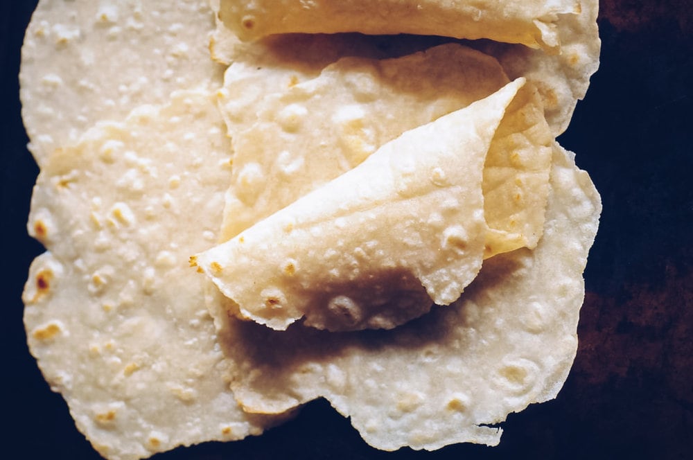 The Best Gluten-Free & Vegan Tortillas that make the perfect pliable and foldable wraps ready for your favorite fillings or served alongside your favorite Mexican meals! They only take 4 ingredients, are super simple and easy to make, and absolutely delicious! #glutenfreetortillas #glutenfreewraps #thebestglutenfreetortillas #easytortillas #vegantortillas #veganwrap #glutenfreemexican 