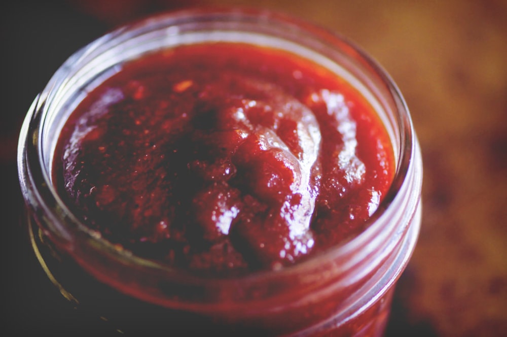  An easy, healthy, and delicious Vegan BBQ Sauce. It is slightly spicy, subtly sweet and oh so TASTY! #veganbbqsauce #veganbarbecuesauce #bbqsauce #barbecuesauce 