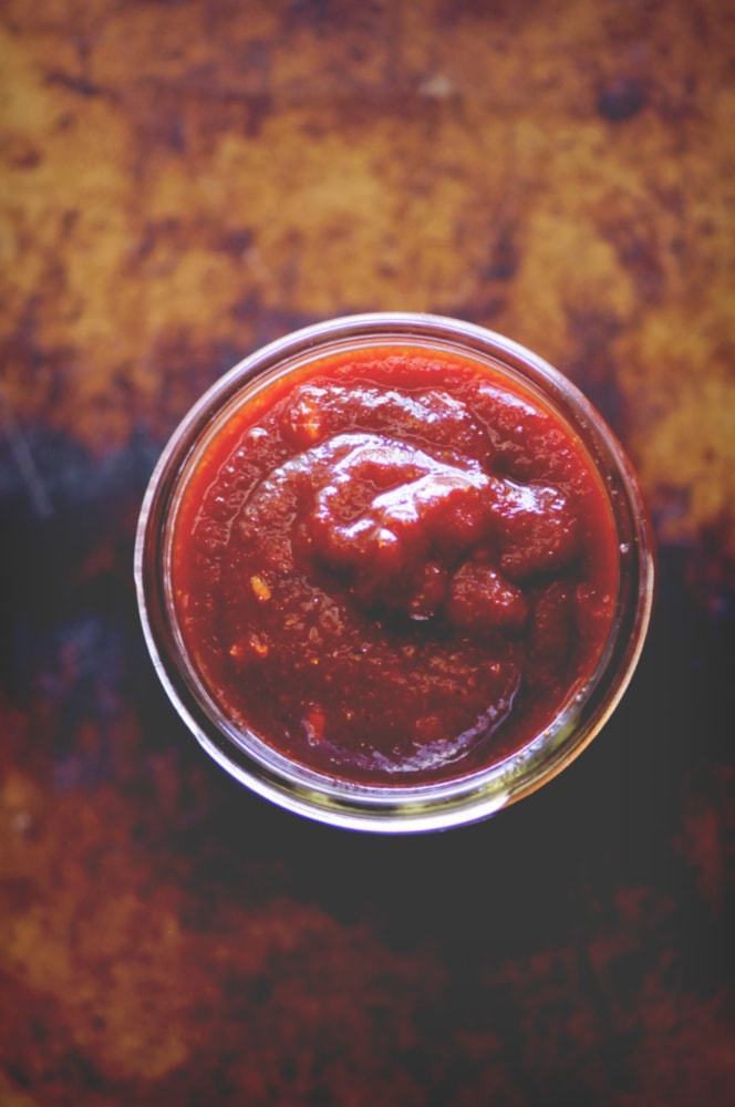  An easy, healthy, and delicious Vegan BBQ Sauce. It is slightly spicy, subtly sweet and oh so TASTY! #veganbbqsauce #veganbarbecuesauce #bbqsauce #barbecuesauce 