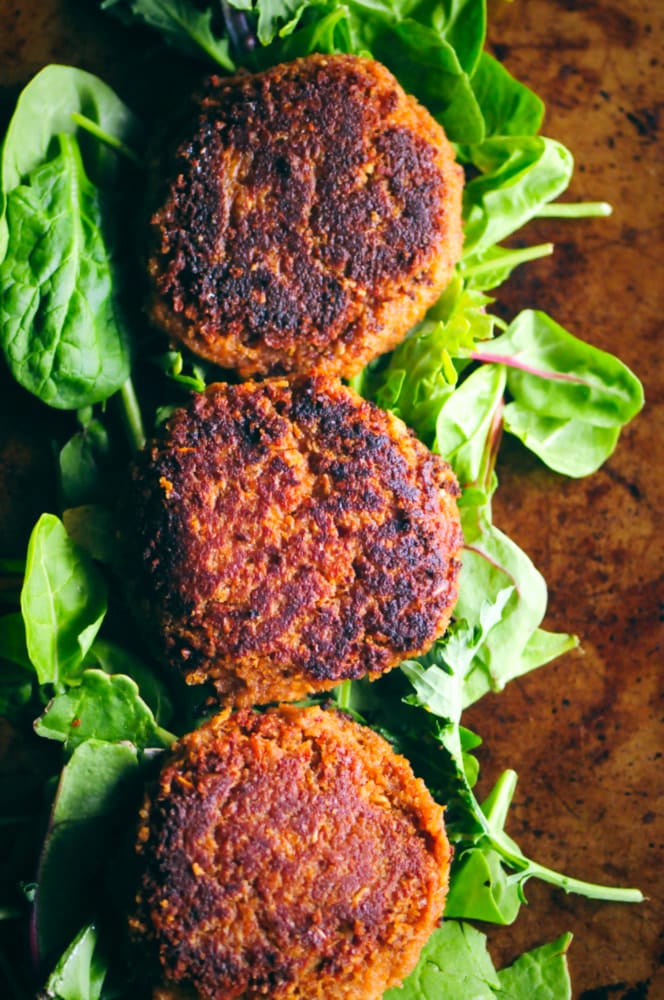  Healthy, easy, and delicious BBQ Chickpea Walnut Burgers. These hearty and filling vegan and gluten-free burgers can be pan-fried or grilled; and pack a most delightful flavorful punch! #veggieburgers #veganbbq #chickpeaburgers #walnutburgers #veganburgers #veganbbqburgers 