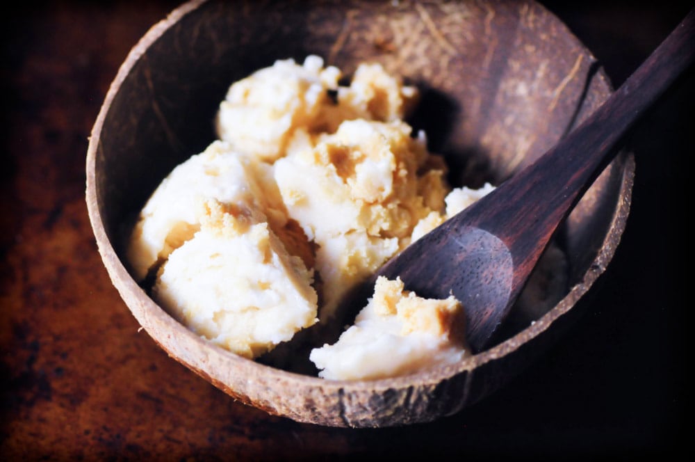  An easy, creamy and delicious Double Coconut Caramel Cookie Dough Ice Cream. A delightful vegan coconut ice cream base made with sweetened condensed coconut milk is studded with tasty and chewy gluten-free coconut caramel cookie dough bites in this frozen treat perfect for summer or any time of the year! #vegancookiedoughicecream #glutenfreecookiedoughicecream #coconutcookiedough #caramelcookiedough #coconuticecream #veganicecream #glutenfreecookiedough 