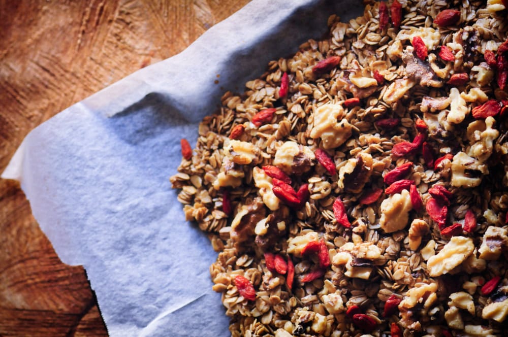  This easy, healthy and delicious Maple Walnut Goji Berry Granola makes for one satisfying gluten-free vegan breakfast, snack or refined sugar-free treat! #gojiberrygranola #trailmix #walnutgranola #maplegranola #vegangranola #glutenfreegranola #gojiberries 