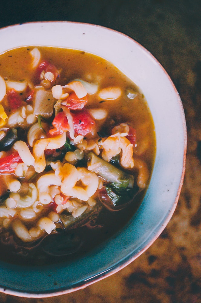  This high-protein Gluten-Free and Vegan Lentil Minestrone Soup is packed with hearty, healthy, and delicious ingredients and can be ready on the table in under 30 minutes! #glutenfreeveganminestrone #glutenfreevegansoup #glutenfreeminestronesoup #veganminestrone #lentilminestrone #lentilsoup 