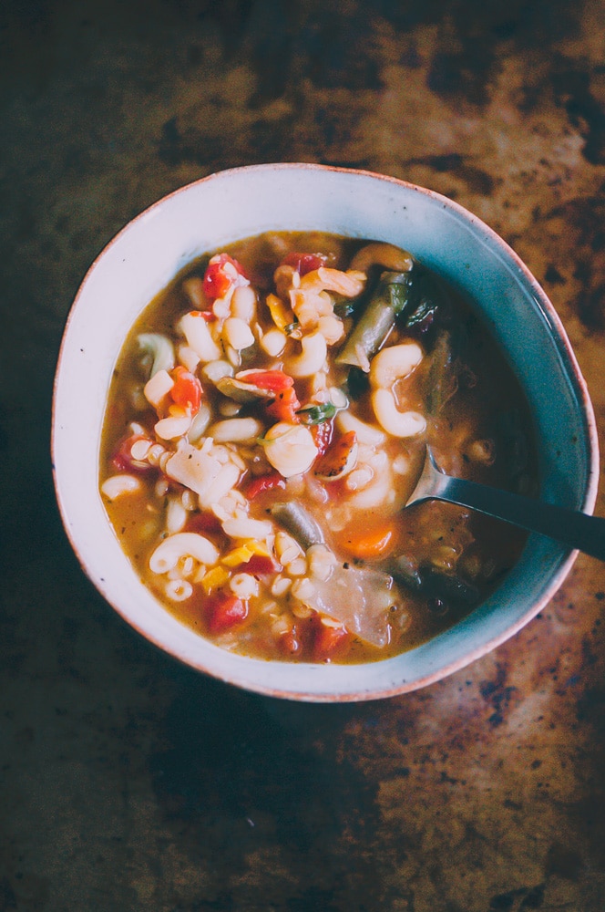  This high-protein Gluten-Free and Vegan Lentil Minestrone Soup is packed with hearty, healthy, and delicious ingredients and can be ready on the table in under 30 minutes! #glutenfreeveganminestrone #glutenfreevegansoup #glutenfreeminestronesoup #veganminestrone #lentilminestrone #lentilsoup 