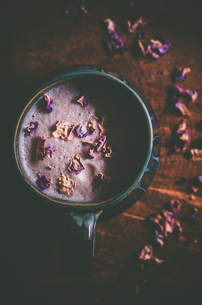  This Vegan Almond Rose Chai Tea Latte sweetened with only maple syrup is genuinely one of the tastiest things I have ever created. It is SO good. The hints of almond, rose, and maple paired with traditional chai spice flavors like cinnamon and cardamom truly makes for one ridiculously delicious, healthy, and comforting beverage! It’s a bit on the enchanting side, too! #chaitea #chailatte #roselatte #almondrose #chaitealatte #veganchai #enchanting #moonmilk #veganlatte 