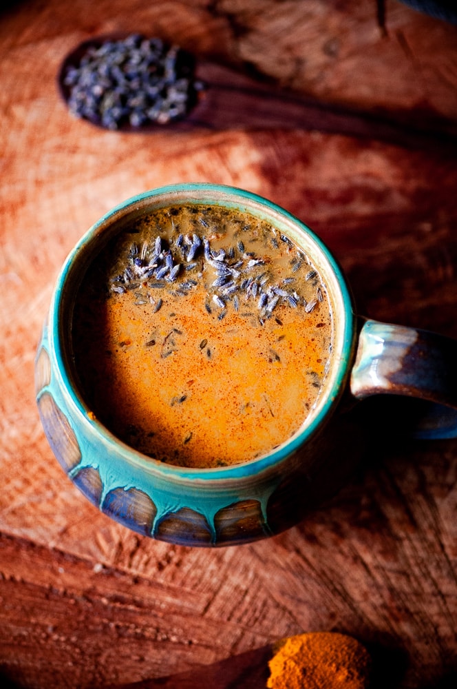  This Vegan Golden Lavender Cacao Adaptogen Latte was inspired by and uses  Rasa Koffee’s amazing herbal coffee alternative adaptogen blends.  Their amazing Cacao Rasa is an adaptogenic formula with the addition of Ecuadorian cacao beans. This delicious latte contains amazing health fortifying ingredients such as lavender, turmeric, cinnamon, dandelion, ashwagandha, chaga, reishi and shatavari. #lavenderlatte #cacao #goldenmilk #veganlatte #moonmilk #rasakoffee #adaptogenlatte #adaptogens 
