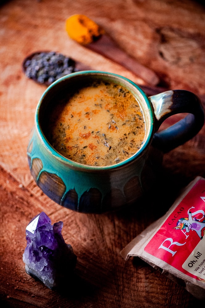  This Vegan Golden Lavender Cacao Adaptogen Latte was inspired by and uses  Rasa Koffee’s amazing herbal coffee alternative adaptogen blends.  Their amazing Cacao Rasa is an adaptogenic formula with the addition of Ecuadorian cacao beans. This delicious latte contains amazing health fortifying ingredients such as lavender, turmeric, cinnamon, dandelion, ashwagandha, chaga, reishi and shatavari. #lavenderlatte #cacao #goldenmilk #veganlatte #moonmilk #rasakoffee #adaptogenlatte #adaptogens 