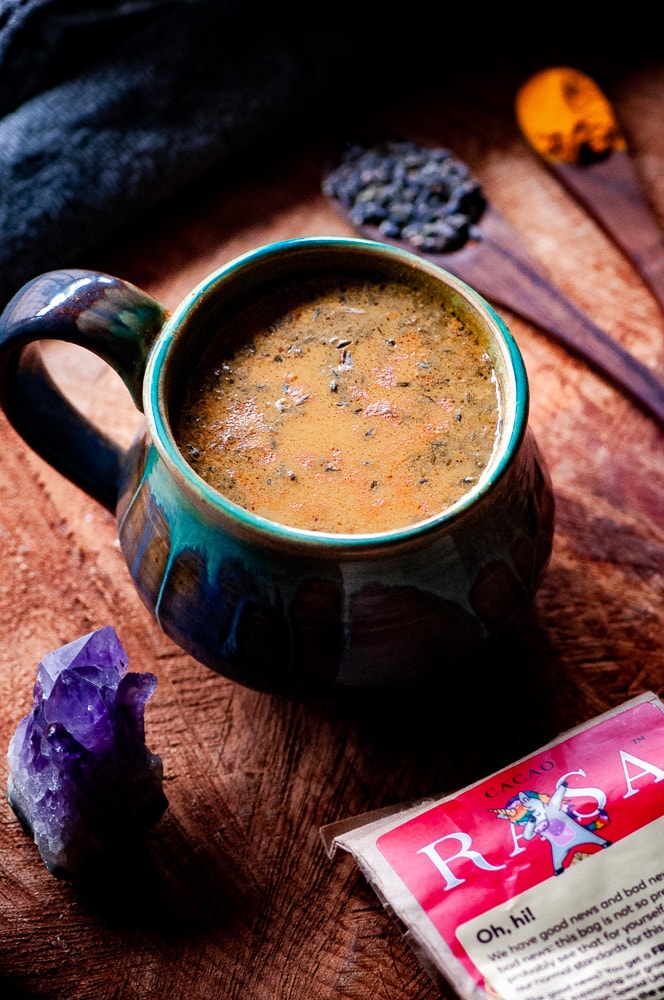  This Vegan Golden Lavender Cacao Adaptogen Latte was inspired by and uses  Rasa Koffee’s amazing herbal coffee alternative adaptogen blends.  Their amazing Cacao Rasa is an adaptogenic formula with the addition of Ecuadorian cacao beans. This delicious latte contains amazing health fortifying ingredients such as lavender, turmeric, cinnamon, dandelion, ashwagandha, chaga, reishi and shatavari. #lavenderlatte #cacao #goldenmilk #veganlatte #moonmilk #rasakoffee #adaptogenlatte #adaptogens 