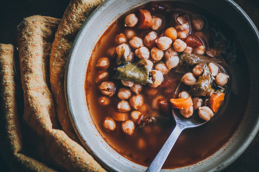  This EASY dump and start Instant Pot Chickpea soup with Cajun seasoning makes for one healthy and flavorful vegan pressure cooker meal #chickpeasoup #cajunseasoning #instantpotsoup #vegansoup 