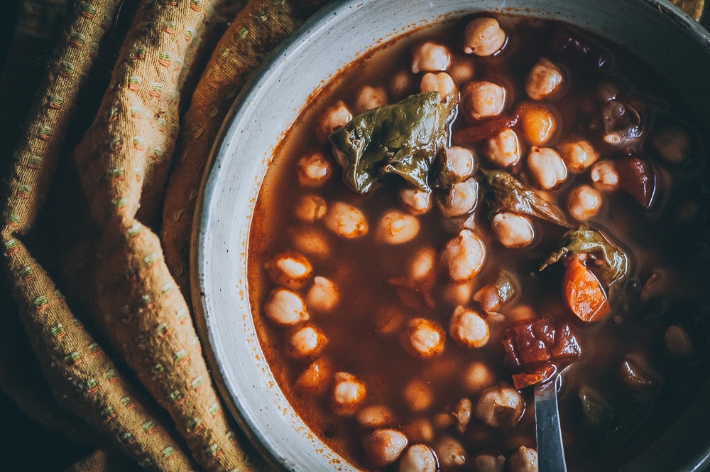  This EASY dump and start Instant Pot Chickpea soup with Cajun seasoning makes for one healthy and flavorful vegan pressure cooker meal #chickpeasoup #cajunseasoning #instantpotsoup #vegansoup 