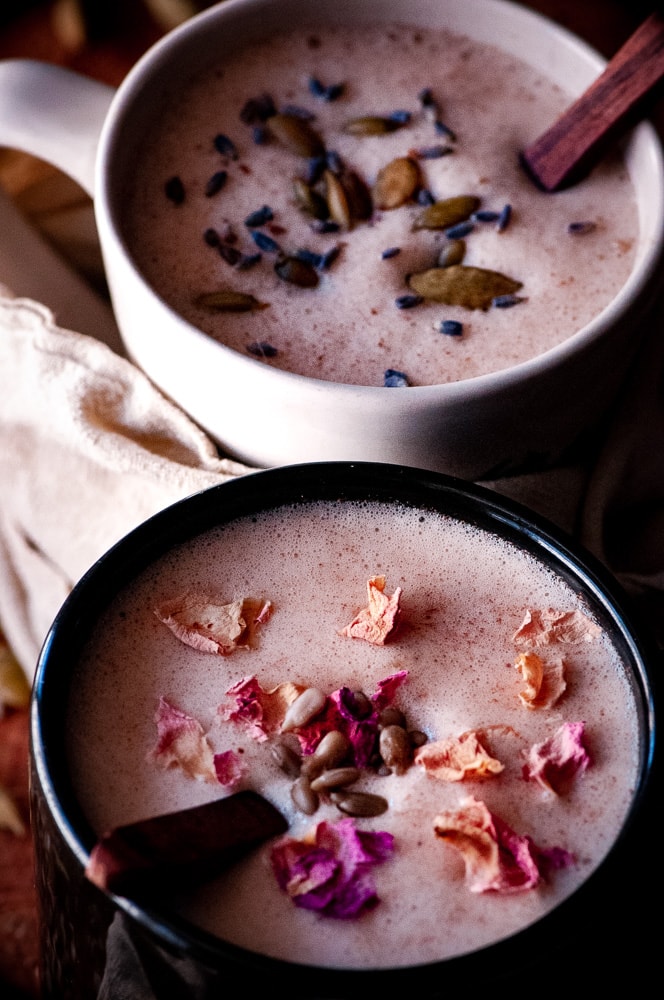  These vegan moon milk recipes make a healthy, easy & delicious way to balance your hormones with the use of seed cycling for hormone balance. These seed cycling moon milk recipes contain powerful nutrient-dense ingredients such as sunflower seeds, pumpkin seeds, rose petals, cardamom, cinnamon, coconut oil and lavender to complement your follicular & luteal reproductive phases to bring you more in sync with the moon & restore healthy menstrual cycles! #moonmilk #seedcycling 