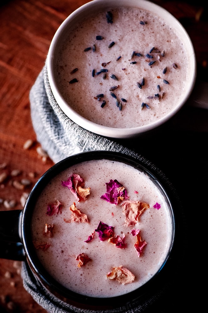  These vegan moon milk recipes make a healthy, easy & delicious way to balance your hormones with the use of seed cycling for hormone balance. These seed cycling moon milk recipes contain powerful nutrient-dense ingredients such as sunflower seeds, pumpkin seeds, rose petals, cardamom, cinnamon, coconut oil and lavender to complement your follicular & luteal reproductive phases to bring you more in sync with the moon & restore healthy menstrual cycles! #moonmilk #seedcycling 