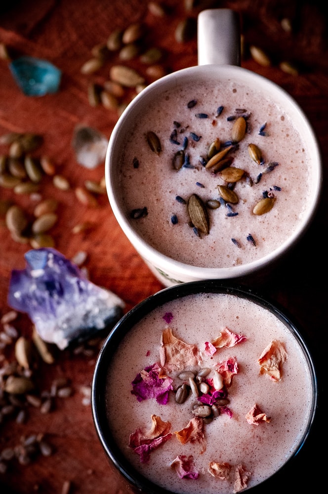  These vegan moon milk recipes make a healthy, easy & delicious way to balance your hormones with the use of seed cycling for hormone balance. These seed cycling moon milk recipes contain powerful nutrient-dense ingredients such as sunflower seeds, pumpkin seeds, rose petals, cardamom, cinnamon, coconut oil and lavender to complement your follicular & luteal reproductive phases to bring you more in sync with the moon & restore healthy menstrual cycles! #moonmilk #seedcycling 