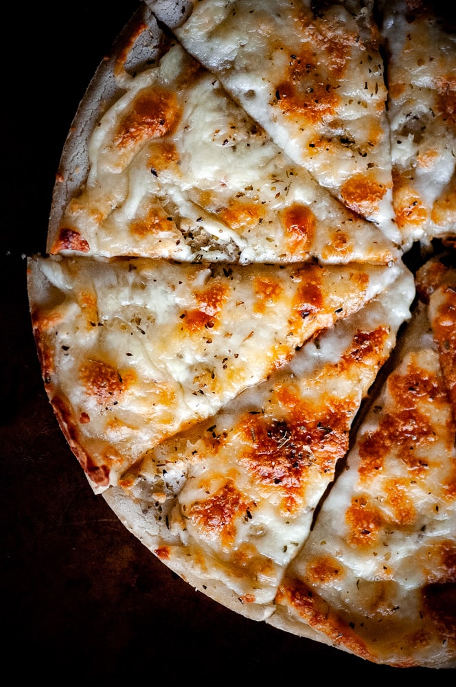  The absolute BEST EASY Gluten-Free Pizza Dough Recipe you will ever find! This Gluten-Free Pizza Crust is made with tapioca flour and is yeast free, gum free, and perfectly chewy (just like gluten containing crusts!). #glutenfreepizza #glutenfreepizzadough #glutenfreepizzaeasy #glutenfreepizzacrust #thebestglutenfreepizzacrust 
