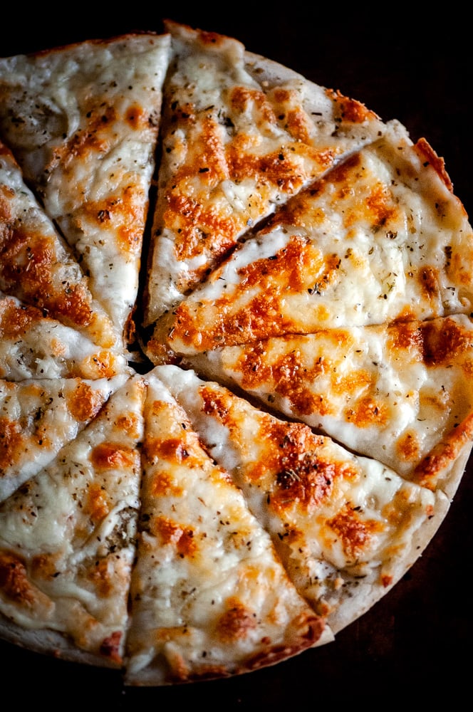  The absolute BEST EASY Gluten-Free Pizza Dough Recipe you will ever find! This Gluten-Free Pizza Crust is made with tapioca flour and is yeast free, gum free, and perfectly chewy (just like gluten containing crusts!). #glutenfreepizza #glutenfreepizzadough #glutenfreepizzaeasy #glutenfreepizzacrust #thebestglutenfreepizzacrust 