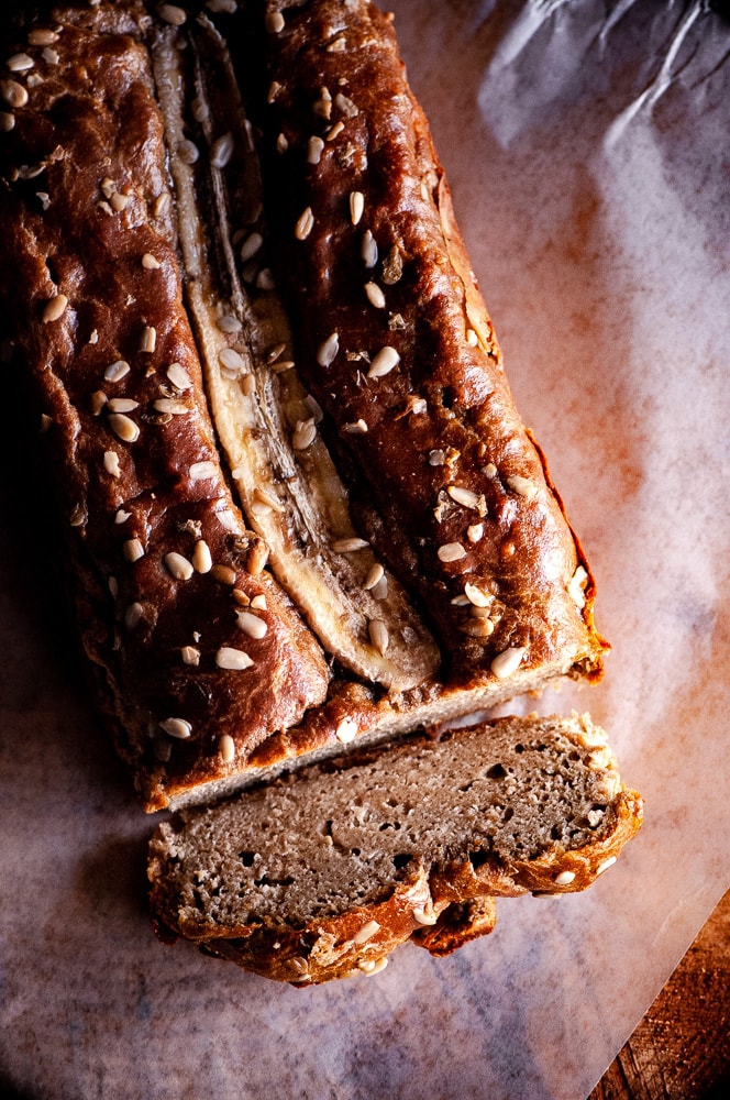  This Gluten-Free Sunflower Butter Bread with bananas, could not be more simple to make! You only need one bowl and 3 ingredients to create a delicious and healthy gluten-free, dairy-free, grain-free bread that slices well and tastes positively delicious! #sunbutter #sunbutterbread #sunflowerseedbutter #flourlessbread #glutenfreebananabread #bananabread #sugarfreebananabread #sunflowerbutter 