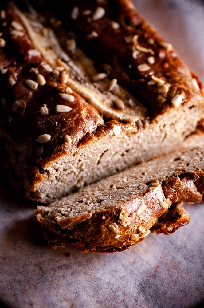  This Gluten-Free Sunflower Butter Bread with bananas, could not be more simple to make! You only need one bowl and 3 ingredients to create a delicious and healthy gluten-free, dairy-free, grain-free bread that slices well and tastes positively delicious! #sunbutter #sunbutterbread #sunflowerseedbutter #flourlessbread #glutenfreebananabread #bananabread #sugarfreebananabread #sunflowerbutter 