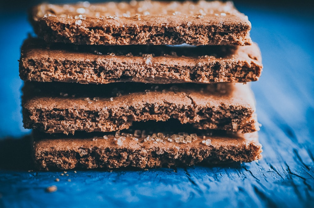  Easy, healthy, and DELICIOUS Gluten-Free Graham Crackers that are also vegan, dairy-free, egg free, soy-free, nut-free and refined sugar-free. This healthy graham cracker recipe is super EASY and certain to please kids and adults alike! #grahamcrackers #glutenfreegrahamcrackers #vegangrahamcrackers #sugarfreegrahamcrackers #glutenfreecheesecake 