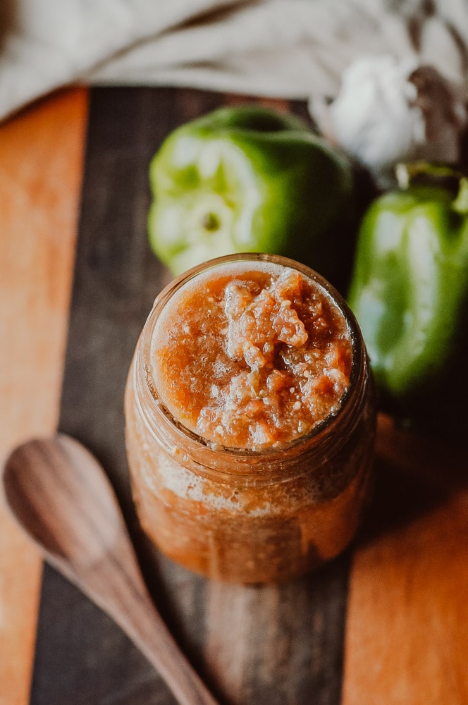  Super EASY + DELICIOUS fermented salsa made with bell peppers, cherry tomatoes, garlic and spices. This vegan homemade spicy salsa is filled with probiotics and gut healing properties and filled with fizzy, rich deliciousness perfect for topping Mexican dishes! #fermentedsalsa #spicysalsa #bellpeppersalsa #homemadesalsarecipe #easysalsarecipe 