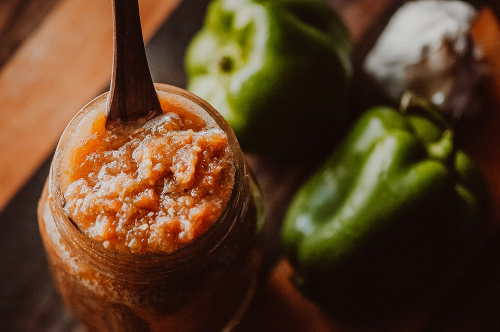  Super EASY + DELICIOUS fermented salsa made with bell peppers, cherry tomatoes, garlic and spices. This vegan homemade spicy salsa is filled with probiotics and gut healing properties and filled with fizzy, rich deliciousness perfect for topping Mexican dishes! #fermentedsalsa #spicysalsa #bellpeppersalsa #homemadesalsarecipe #easysalsarecipe 