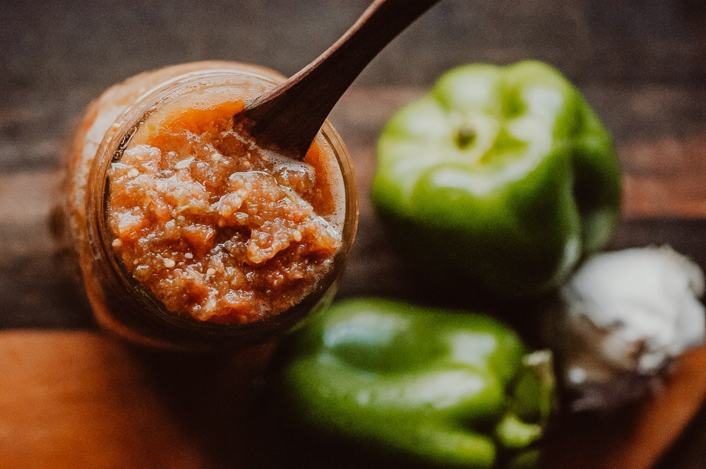  Super EASY + DELICIOUS fermented salsa made with bell peppers, cherry tomatoes, garlic and spices. This vegan homemade spicy salsa is filled with probiotics and gut healing properties and filled with fizzy, rich deliciousness perfect for topping Mexican dishes! #fermentedsalsa #spicysalsa #bellpeppersalsa #homemadesalsarecipe #easysalsarecipe 