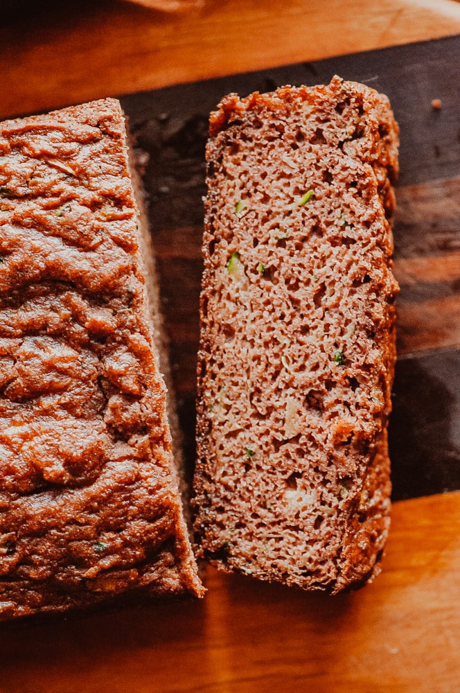   This easy Gluten-Free Zucchini Bread recipe is perfectly moist, fluffy and flavorful! This delicious and healthy bread made with coconut flour is gluten-free, dairy-free, soy-free, nut-free, refined sugar-free and slices like a dream! #zucchinibread #glutenfreezucchinibread #coconutflourzucchinibread #coconutflourbread  