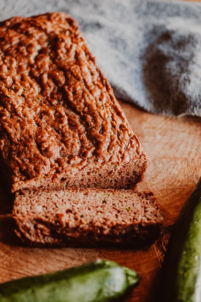   This easy Gluten-Free Zucchini Bread recipe is perfectly moist, fluffy and flavorful! This delicious and healthy bread made with coconut flour is gluten-free, dairy-free, soy-free, nut-free, refined sugar-free and slices like a dream! #zucchinibread #glutenfreezucchinibread #coconutflourzucchinibread #coconutflourbread  