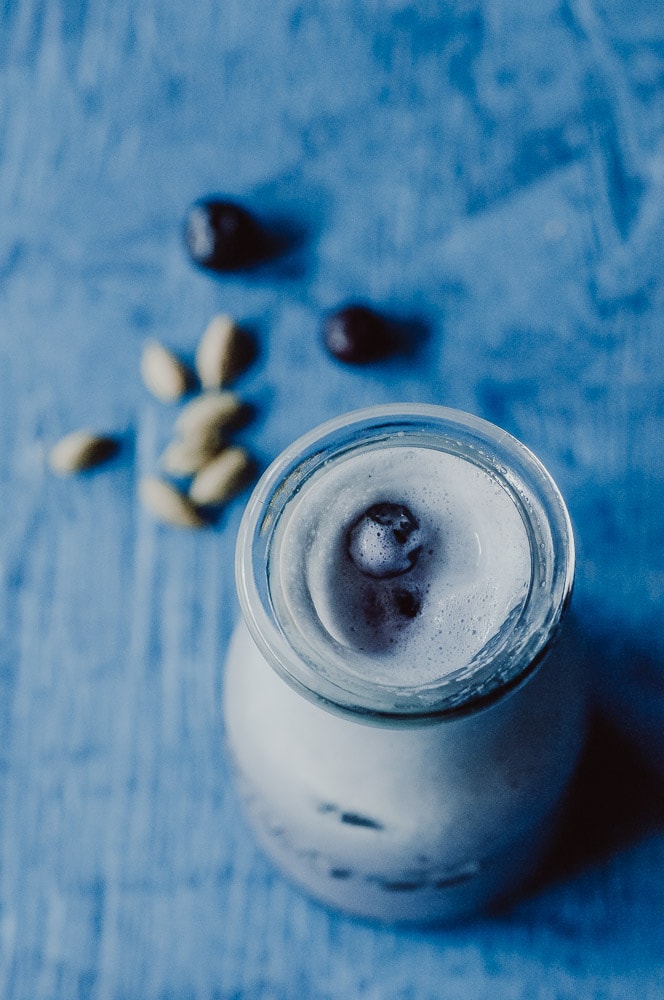  This Iced Moon Milk recipe with blueberry and cardamom is truly REFRESHING, creamy, delicious and packed with healthy ingredients and wonderful calming and relaxing properties thanks to the adaptogen ashwagandha. Vegan, dairy-free, soy-free, nut-free, refined sugar-free. #moonmilk #blueberrymoonmilk #bluemoonmilk #cardamommoonmilk #icedmoonmilk #ashwagandha #moonmilkrecipes 