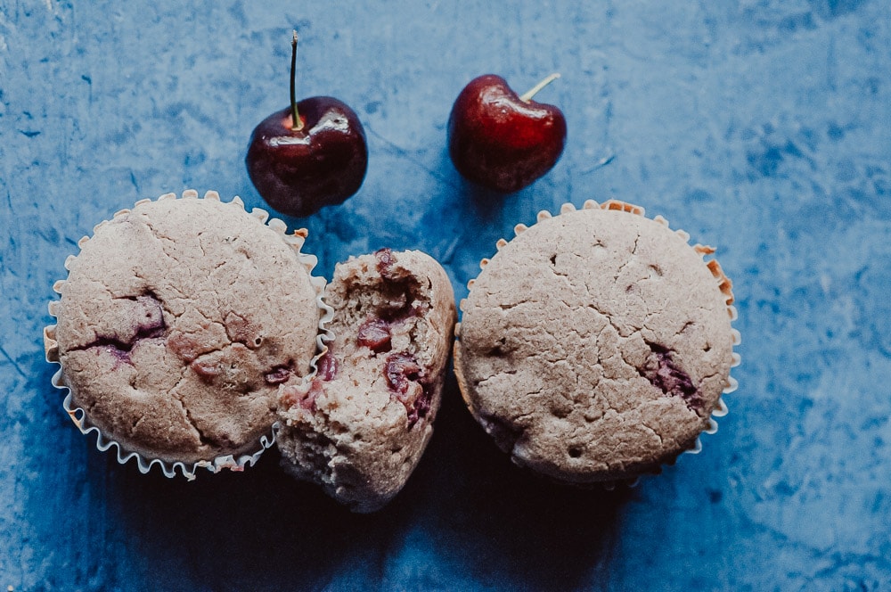   These fluffy Gluten-Free Cherry Muffins have a soft, spongy and juicy cherry cobbler center! Made with a blend of buckwheat flour and tapioca flour, these delightful muffins are super quick and easy to make and filled with pleasing textures and flavors. Gluten-free, vegan, dairy-free, soy-free, nut-free and refined sugar-free. #cherrymuffins #vegancherryrecipes #glutenfreecherrymuffins #buckwheatmuffins #cherrycobbler  